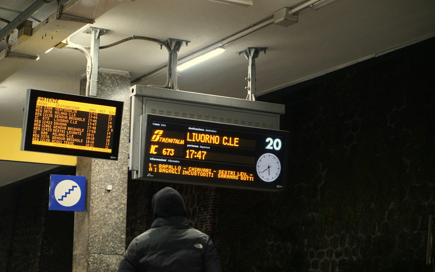 A departure information board in Pisa station